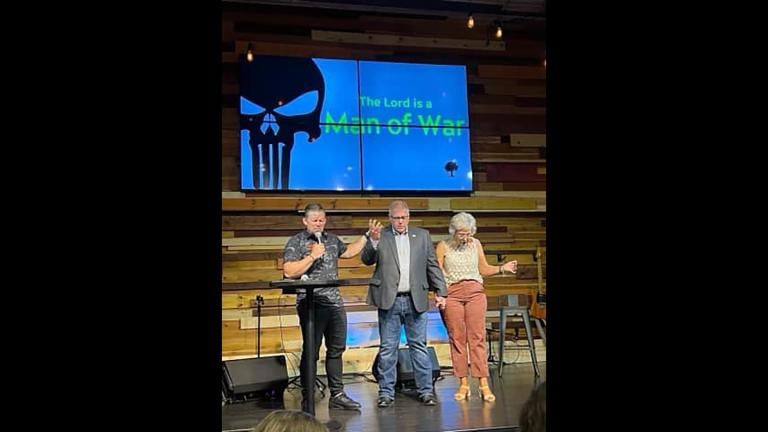 Pastor Brian Phillips, Darren Bailey and Cindy Bailey at the Grove Fellowship in Poplar Grove on Aug. 21, 2022. (Credit: The Grove Fellowship / Facebook)