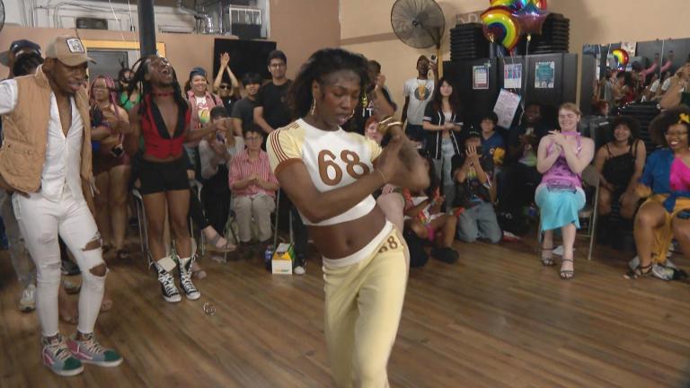 Skai Underwood, TaskForce’s youth engagement specialist, vogues at the organization’s mini ball. (WTTW News)