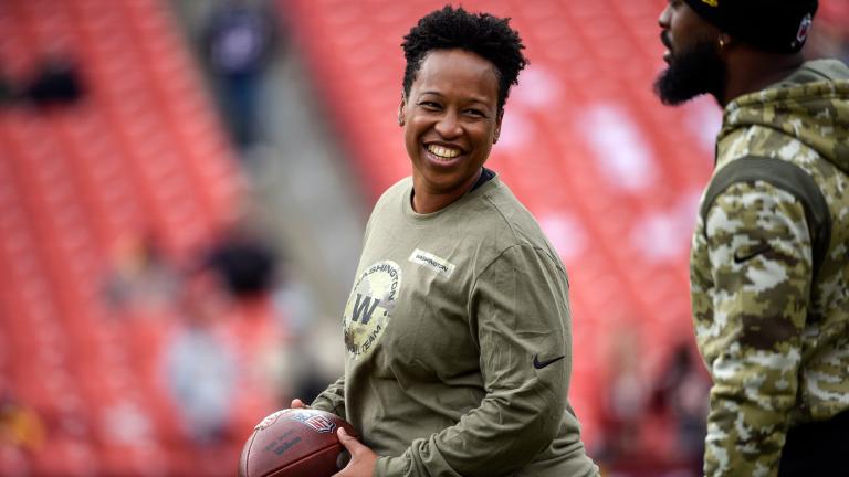 Washington Football Team assistant running backs coach Jennifer King works with the team before an NFL football game against the Tampa Bay Buccaneers, Sunday, Nov. 14, 2021, in Landover, Md. (AP Photo / Mark Tenally)