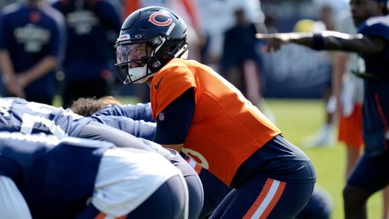 Chicago Bears quarterback Caleb Williams works with teammates during an NFL football training camp practice in Lake Forest, Ill., Thursday, Aug. 8, 2024. (AP Photo / Nam Y. Huh)