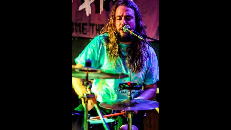 In a photo provided by Russ Boxer, Kevin Clark plays drums as Jess Bess & The Intentions performs at a bar in Highwood, Ill., May 22, 2021. Clark, who played drummer Freddy “Spazzy McGee” Jones in the 2003 movie “School of Rock” with Jack Black, was killed when he was struck by a car while riding his bicycle along a Chicago street early Wednesday, May 26. (Russ Boxer via AP)In a photo provided by Russ Boxer, Kevin Clark plays drums as Jess Bess & The Intentions performs at a bar in Highwood, Ill., May 22, 2