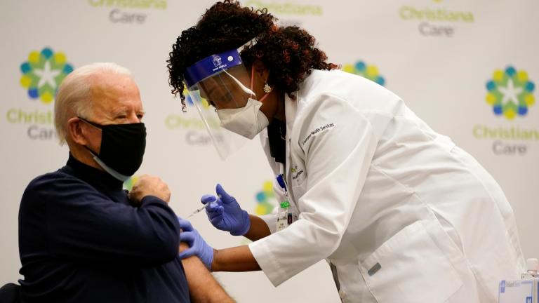President-elect Joe Biden receives his first dose of the coronavirus vaccine at ChristianaCare Christiana Hospital in Newark, Del., Monday, Dec. 21, 2020, from nurse practitioner Tabe Mase. (AP Photo / Carolyn Kaster)