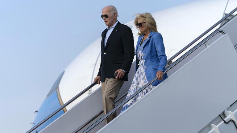 President Joe Biden, left, and first lady Jill Biden walk down the stairs of Air Force One upon arrival to Joint Base Andrews, Md., en route to the White House, Sunday, Aug. 18, 2024. (AP Photo / Jose Luis Magana)