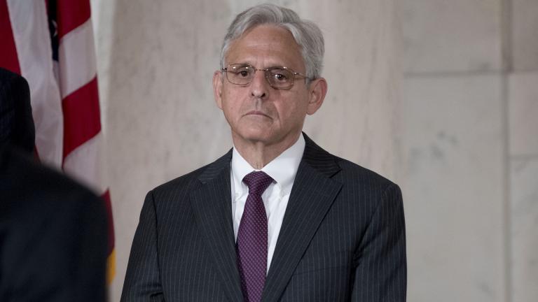 In this July 22, 2019, file photo, Merrick Garland pays his respects for the late Supreme Court Justice John Paul Stevens in the Great Hall of the Supreme Court in Washington. (AP Photo/Andrew Harnik, File)