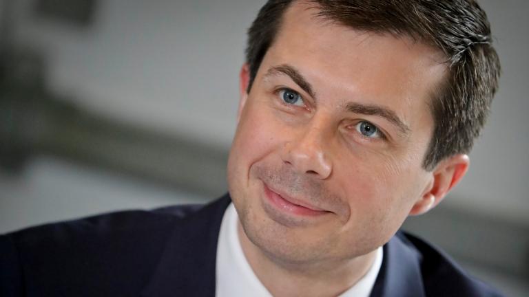 In this April 29, 2019 file photo, then Democratic presidential candidate Mayor Pete Buttigieg, from South Bend, Indiana, listens during a lunch meeting with civil rights leader Rev. Al Sharpton at Sylvia's Restaurant in Harlem neighborhood of New York. (AP Photo / Bebeto Matthews, Pool)