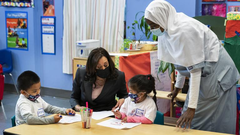 In this June 11, 2021, file photo, Vice President Kamala Harris talks with bilingual early childhood education school CentroNia students Jayden Bello, left, and Celina Barrera during a visit to the school in northwest Washington. Teacher Billo Diawara, right, watches. (AP Photo / Manuel Balce Ceneta, File) In this June 11, 2021, file photo, Vice President Kamala Harris talks with bilingual early childhood education school CentroNia students Jayden Bello, left, and Celina Barrera during a visit to the school in northwest Washington. Teacher Billo Diawara, right, watches. (AP Photo / Manuel Balce Ceneta, File)