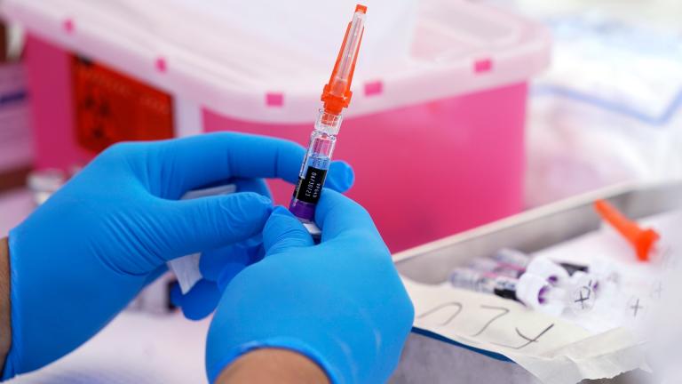 A flu vaccine is readied at the L.A. Care and Blue Shield of California Promise Health Plans’ Community Resource Center, Oct. 28, 2022, in Lynwood, Calif. (AP Photo / Mark J. Terrill, File)