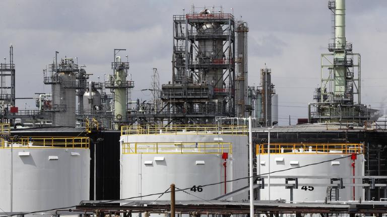 Storage tanks are shown at a refinery in Detroit, Tuesday, April 21, 2020. The White House on Tuesday said it had ordered 50 million barrels of oil released from strategic reserve to bring down energy costs. (AP Photo/Paul Sancya, File)