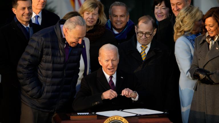 President Joe Biden signs the Respect for Marriage Act, Tuesday, Dec. 13, 2022, on the South Lawn of the White House in Washington. (AP Photo / Andrew Harnik)