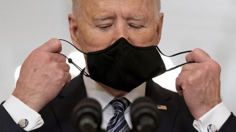 President Joe Biden takes off his mask to speak about the COVID-19 pandemic during a prime-time address from the East Room of the White House, on March 11, 2021, in Washington. (AP Photo / Andrew Harnik, File)