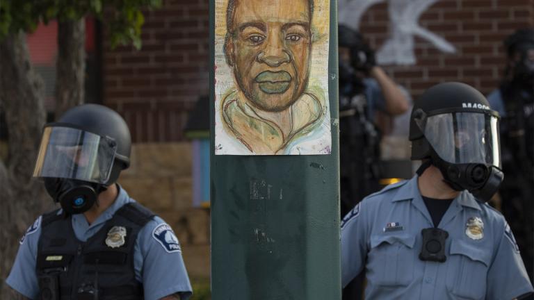 Minneapolis police stand outside the department’s 3rd Precinct on May 27, 2020, in Minneapolis. (Carlos Gonzalez / Star Tribune via AP, File)
