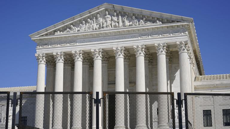 In this March 21, 2021, file photo security fencing surrounds the Supreme Court building on Capitol Hill in Washington. (AP Photo / Patrick Semansky, File)