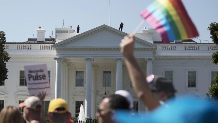 In this Sunday, June 11, 2017 file photo, Equality March for Unity and Pride participants march past the White House in Washington. (AP Photo / Carolyn Kaster)