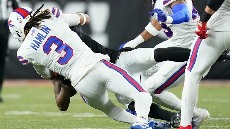 Cincinnati Bengals wide receiver Tee Higgins (85) collides with Buffalo Bills safety Damar Hamlin (3) during the first half of an NFL football game, Monday, Jan. 2, 2023, in Cincinnati. Hamlin was injured on the play. (AP Photo / Joshua A. Bickel)