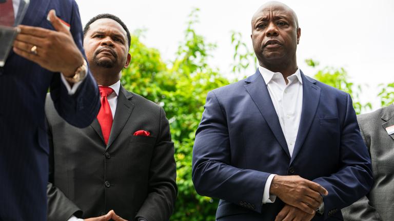Aurora Mayor Richard Irvin and U.S. Sen. Tim Scott (R-South Carolina) listen to one of the speakers at an event Irvin hosted for Black Republicans attending the RNC on Tuesday, July 16. (Michael Izquierdo / WTTW News)