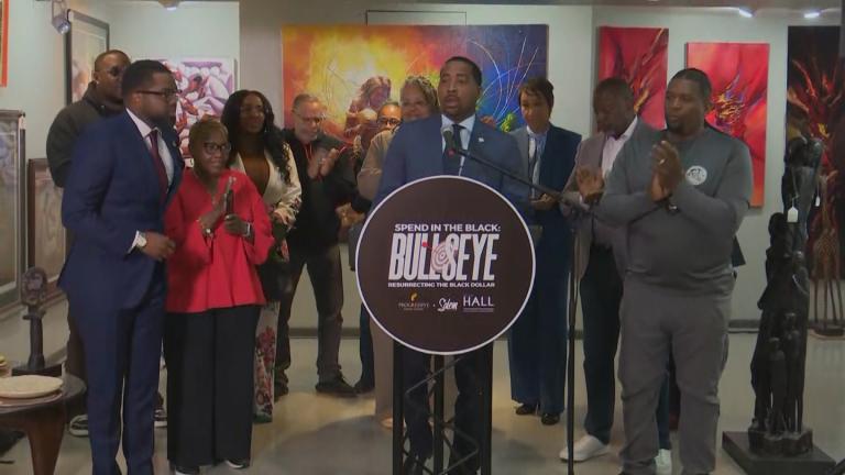 Ald. William Hall (6th Ward) joins Black business owners and faith leaders at Woodshop Art Gallery on April 17, 2025, to preview an event supporting Black-owned businesses. (WTTW News)