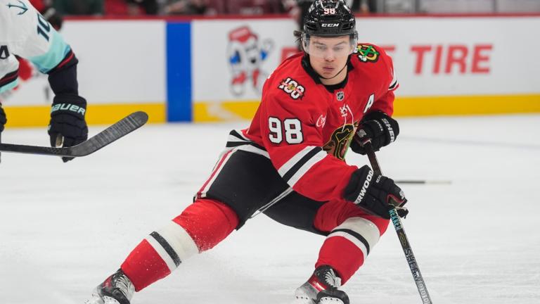 Chicago Blackhawks center Connor Bedard handles the puck during the second period of an NHL hockey game against the Seattle Kraken, Nov. 20, 2025, in Chicago. (AP Photo / Erin Hooley, File)