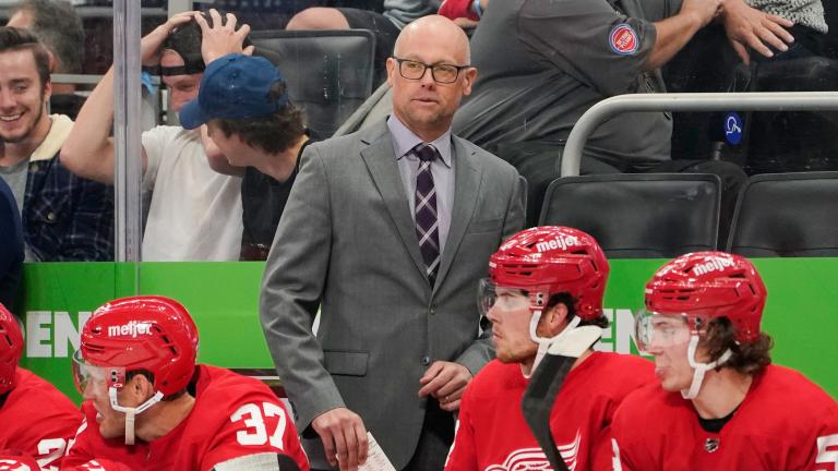 Detroit Red Wings head coach Jeff Blashill watches during the third period of an NHL preseason hockey game against the Chicago Blackhawks, Monday, Oct. 4, 2021, in Detroit. (AP Photo/Paul Sancya, File)
