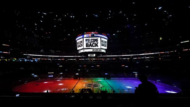 The ice is lit in rainbow light for Pride Night before an NHL hockey game between the Anaheim Ducks and the Los Angeles Kings, Monday, April 26, 2021, in Los Angeles. (AP Photo / Ashley Landis, File)