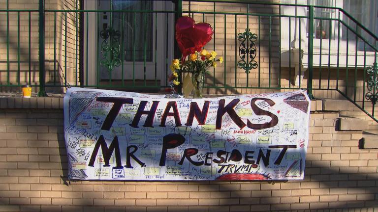 A banner on the Chicago home of Rod Blagojevich thanks President Donald Trump for commuting the former governor’s 14-year prison sentence. (WTTW News)