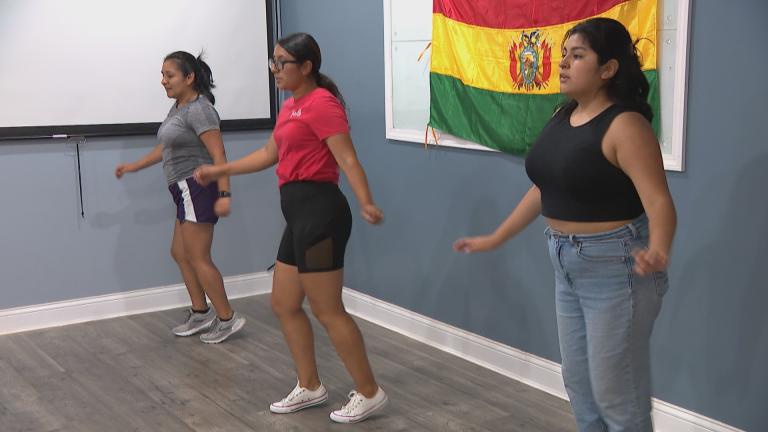 Dancers prepare for the Renacer Bolivia Summer Festival, set to take place Aug. 7. 2022. (WTTW News)