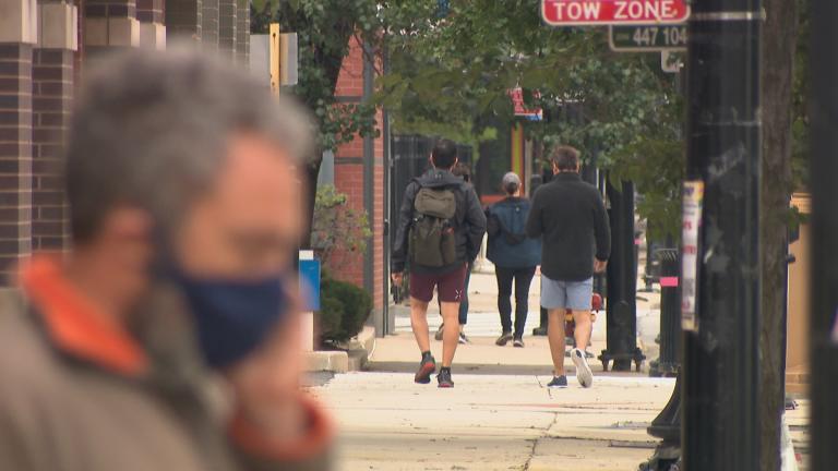 Pedestrians in Chicago’s Northalsted neighborhood on a September day. (WTTW News) Pedestrians in Chicago’s Northalsted neighborhood on a September day. (WTTW News)