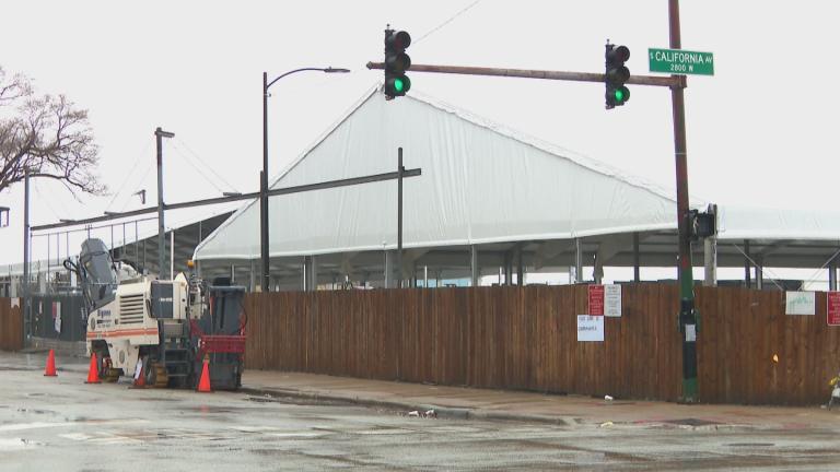 Work is underway at a base camp for migrants in Brighton Park on Dec. 1, 2023. (WTTW News)