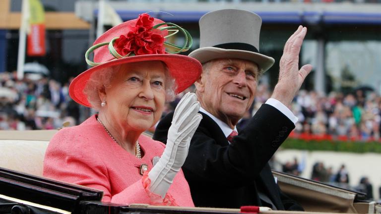 In this Thursday June, 16, 2011 file photo Britain’s Queen Elizabeth II with Prince Philip arrive by horse drawn carriage in the parade ring on the third day, traditionally known as Ladies Day, of the Royal Ascot horse race meeting at Ascot, England. (AP Photo/Alastair Grant, File) In this Thursday June, 16, 2011 file photo Britain’s Queen Elizabeth II with Prince Philip arrive by horse drawn carriage in the parade ring on the third day, traditionally known as Ladies Day, of the Royal Ascot horse race meeting at Ascot, England. (AP Photo/Alastair Grant, File)