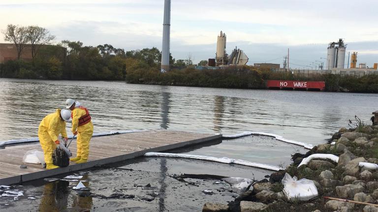 Workers from the Environmental Protection Agency respond to an oil spill Oct. 26 at a fork of the Chicago River known as Bubbly Creek. (EPA) 