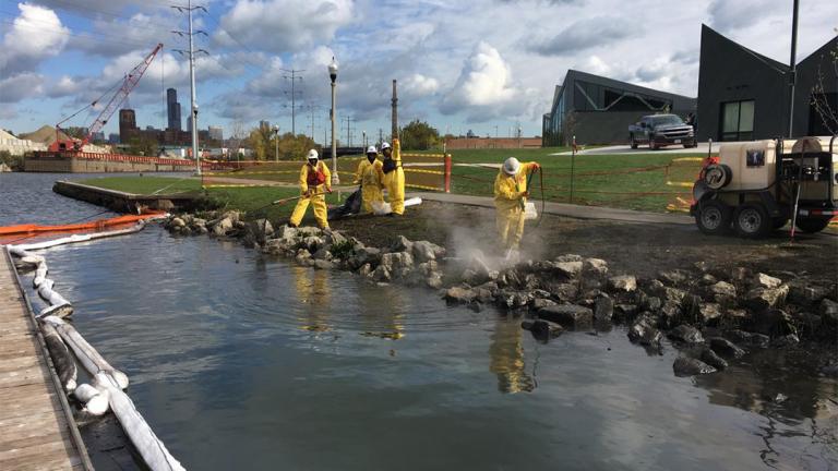 Workers from the Environmental Protection Agency respond to an oil spill that was reported Oct. 26 at a fork of the Chicago River known as Bubbly Creek. (EPA)