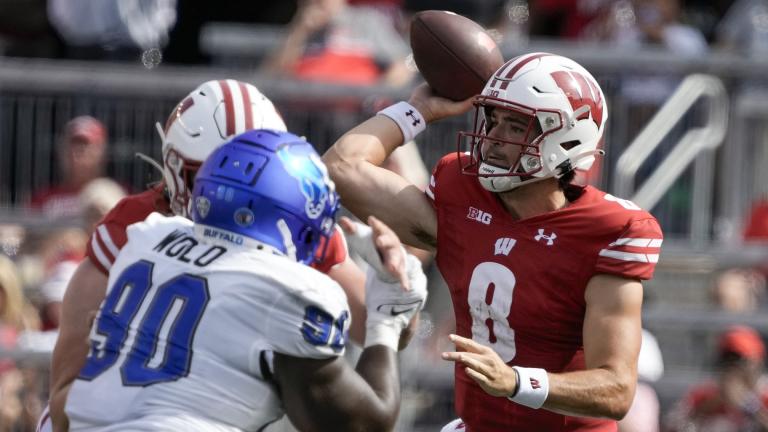 Wisconsin quarterback Tanner Mordecai (8) throws during the first half of an NCAA college football game against Buffalo Saturday, Sept. 2, 2023, in Madison, Wis. (AP Photo / Morry Gash)