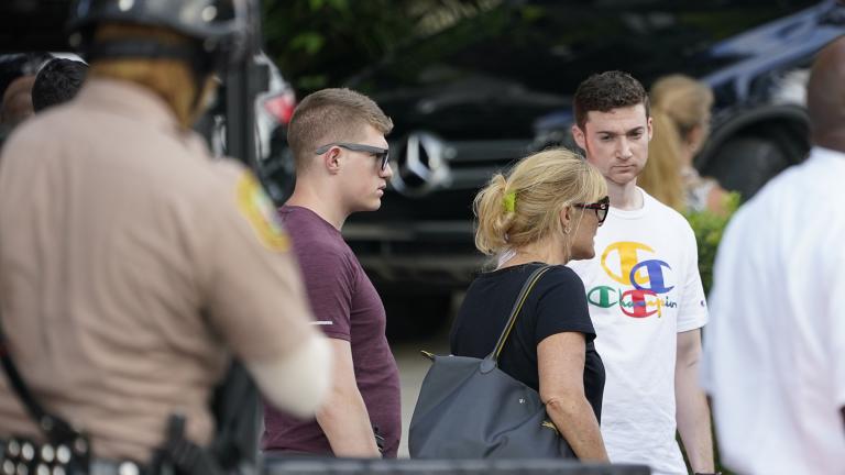 Family members of those missing from Champlain Towers South Condo collapse arrive back at the reunification center after visiting the scene in Surfside, Fla., Sunday, June 27, 2021. Rescuers keep digging through the mound of rubble and clinging to hope that someone could be found alive. (AP Photo / Marta Lavandier)