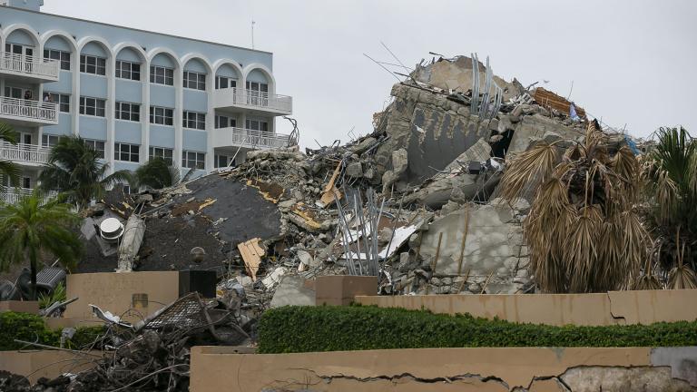 Rubble and debris of the Champlain Towers South condo can be seen Tuesday, July 6, 2021 in Surfside, Fla. (Carl Juste / Miami Herald via AP)