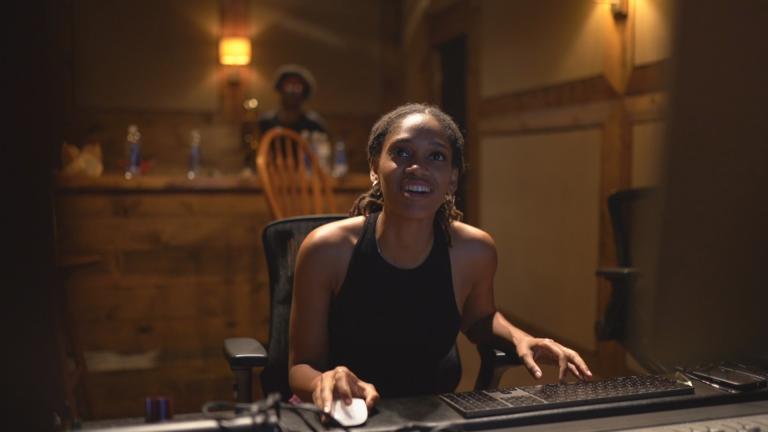 Aesha “Eesh” Dominguez works on new theme music for “Chicago Tonight.” (WTTW News)