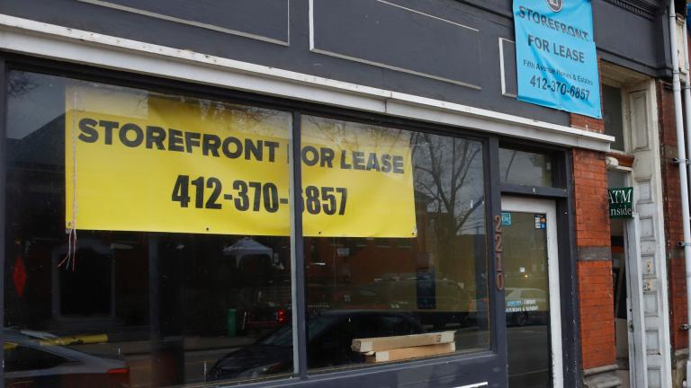 In this Jan. 7, 2021, file photo, an empty storefront is seen among other businesses along East Carson Street in the Southside neighborhood of Pittsburgh. (AP Photo / Keith Srakocic, File)