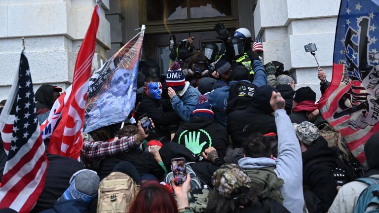 Trump supporters clash with police and security forces as they storm the Capitol in Washington, D.C. on Jan. 6, 2021.(Brendan Smialowski / AFP / Getty Images) Trump supporters clash with police and security forces as they storm the Capitol in Washington, D.C. on Jan. 6, 2021.(Brendan Smialowski / AFP / Getty Images)