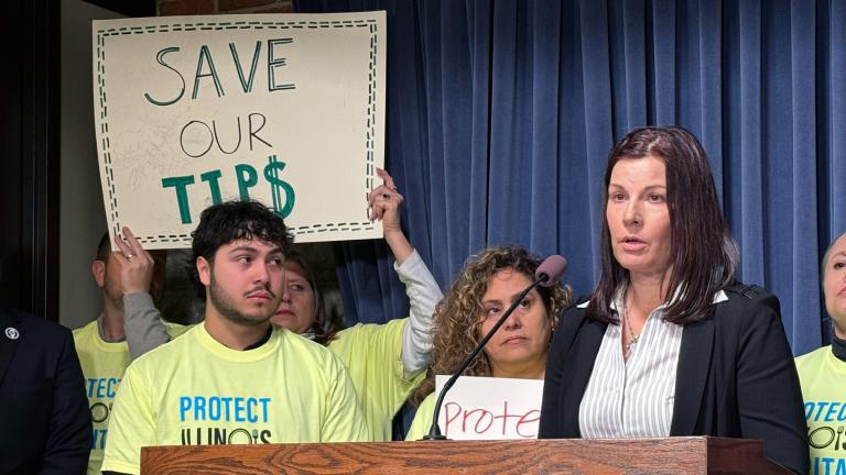 Karen Conn, president of Conn’s Hospitality Group in Springfield, speaks at a news conference April 3, 2024, at the Capitol. She said she will have to raise prices and cut employees’ hours and benefits if the state eliminates a tipped wage credit. (Cole Longcor / Capitol News Illinois)