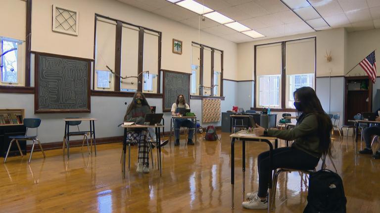 Students sit masked and socially distanced in a CPS classroom. (WTTW News)