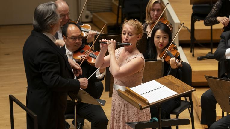 CSO Piccolo Jennifer Gunn is the soloist in Ken Benshoof’s “Concerto in Three Movements” with Music Director Riccardo Muti and the CSO. (© Todd Rosenberg)