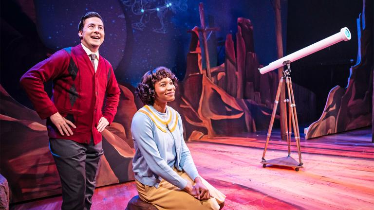 John Putnam (Christopher Kale Jones) and Ellen Fields (Jaye Ladymore) look to the stars in Chicago Shakespeare's world premiere production of It Came From Outer Space, in the theater Upstairs at Chicago Shakespeare, June 22–July 24, 2022. (Credit: Liz Lauren).