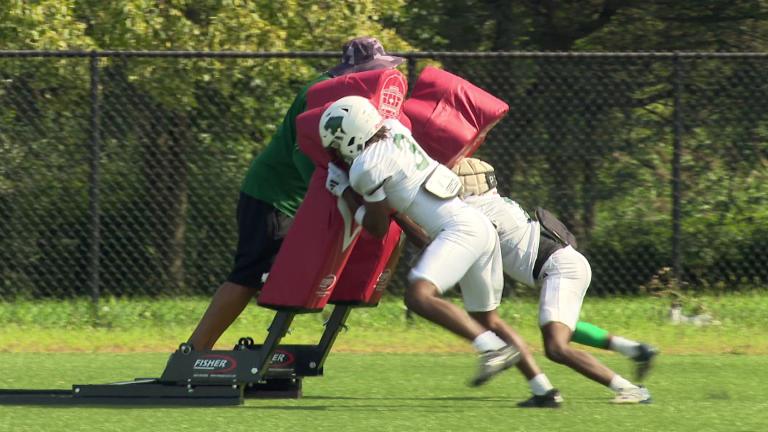 The Chicago State University football team at practice. (WTTW News)