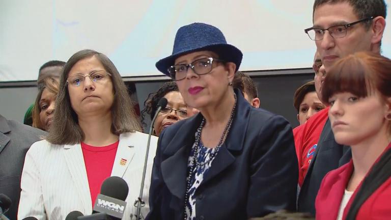 Karen Lewis and members of the Chicago Teachers Union announce on Sept. 28 a strike date of Oct. 11 if no contract agreement is reached with Chicago Public Schools. (Brandis Friedman / Chicago Tonight)