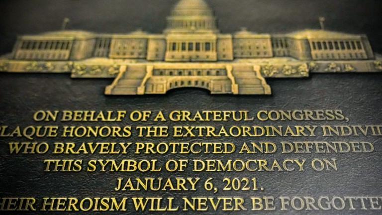 A replica plaque commemorating the Jan. 6, 2021 Capitol riot hangs outside the office of Rep. Zoe Lofgren, D-Calif., Tuesday, Dec. 30, 2025, at the Longworth House Office Building on Capitol Hill in Washington. (AP Photo / Julia Demaree Nikhinson)