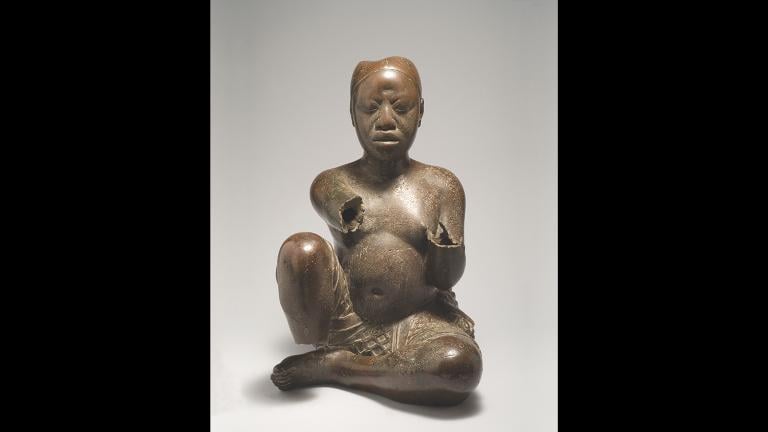 Seated Figure, Possibly Ife, Tada Nigeria, Late 13th-14th century, Copper with traces of arsenic, lead, and tin, H. 54 cm, Nigerian National Commission for Museums and Monuments, 79.R18, Image courtesy of National Commission for Museums and Monuments, Abuja, Nigeria. 