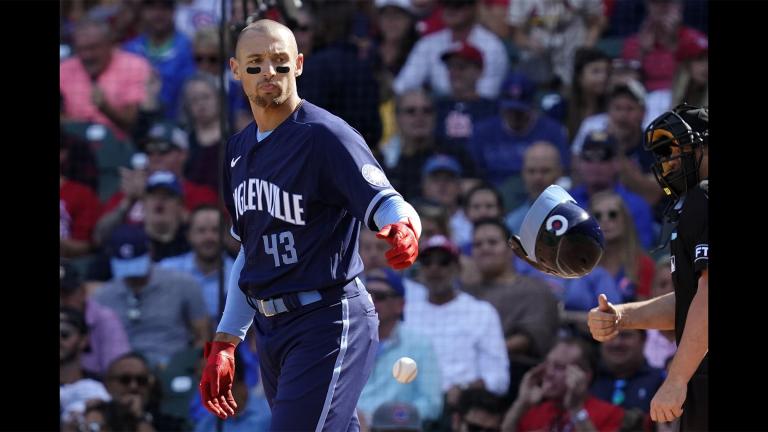 Chicago Cubs' Trayce Thompson throws his helmet after striking out swinging during the fourth inning in the first baseball game of a doubleheader against the St. Louis Cardinals in Chicago, Friday, Sept. 24, 2021. (AP Photo / Nam Y. Huh)