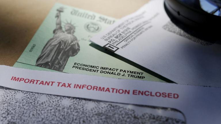 In this April 23, 2020, file photo, President Donald Trump’s name is seen on a stimulus check issued by the IRS to help combat the adverse economic effects of the COVID-19 outbreak, in San Antonio. (AP Photo / Eric Gay, File)