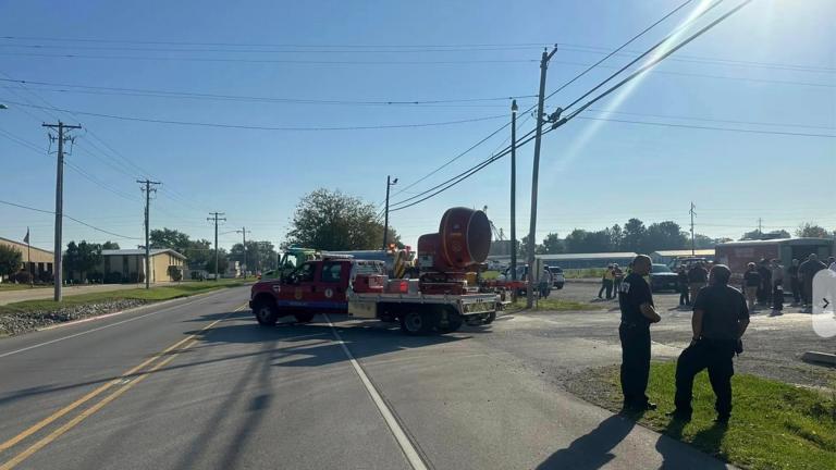 Emergency responders work the scene of semitruck crash in Teutopolis, Ill., on Saturday, Sept. 30, 2023. Federal regulators confirmed Saturday they are reviewing the crash of a semitruck carrying a toxic substance in central Illinois, resulting in “multiple fatalities” and dangerous air conditions that prompted the evacuation of area residents. (NewsNation-WTWO via AP)