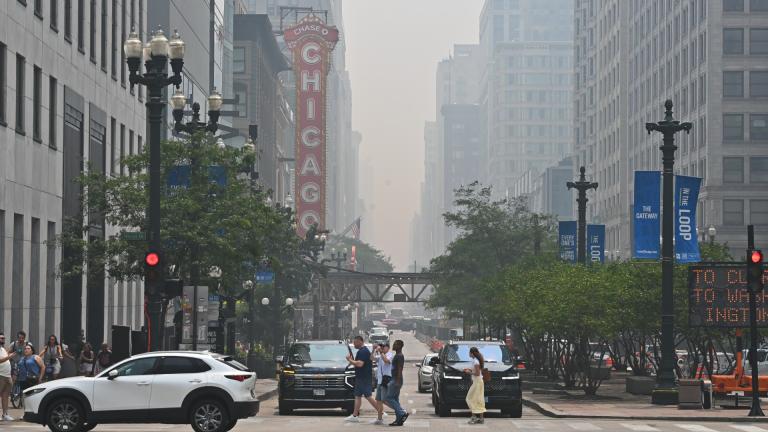 Wildfire smoke casts a haze over downtown Chicago on July 16, 2026. (Victor Hilitski / WTTW News)