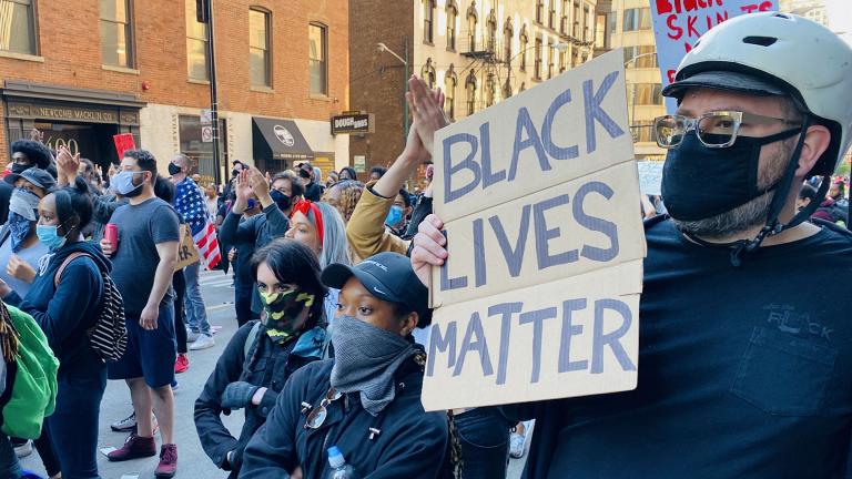 Protesters gather in Chicago on Saturday, May 30, 2020 following the death of George Floyd at the hands of Minneapolis police. There are now several pending attempts to trademark the phrase “Black Lives Matter.” (Hugo Balta / WTTW News)