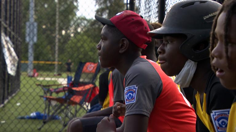 Participants in Chicago Westside Sports play baseball at Columbus Park. (WTTW News)